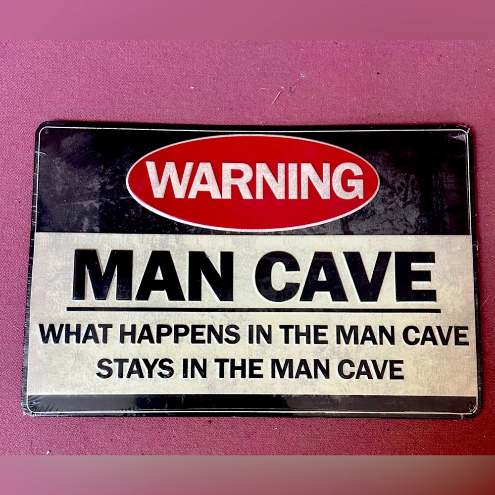 Metal Man Cave Sign